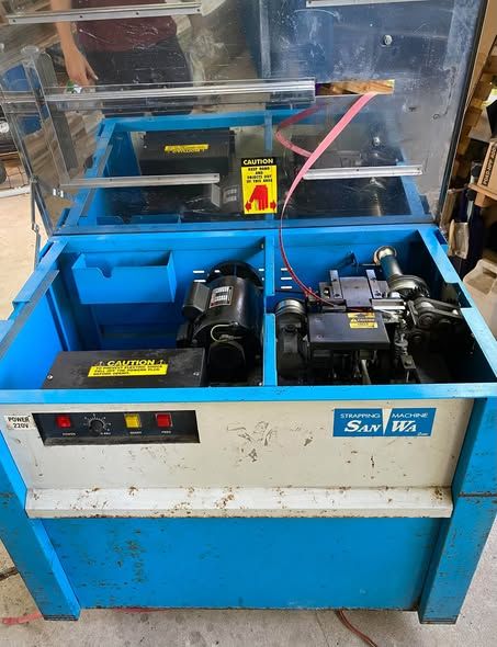 Box Strapping Machine